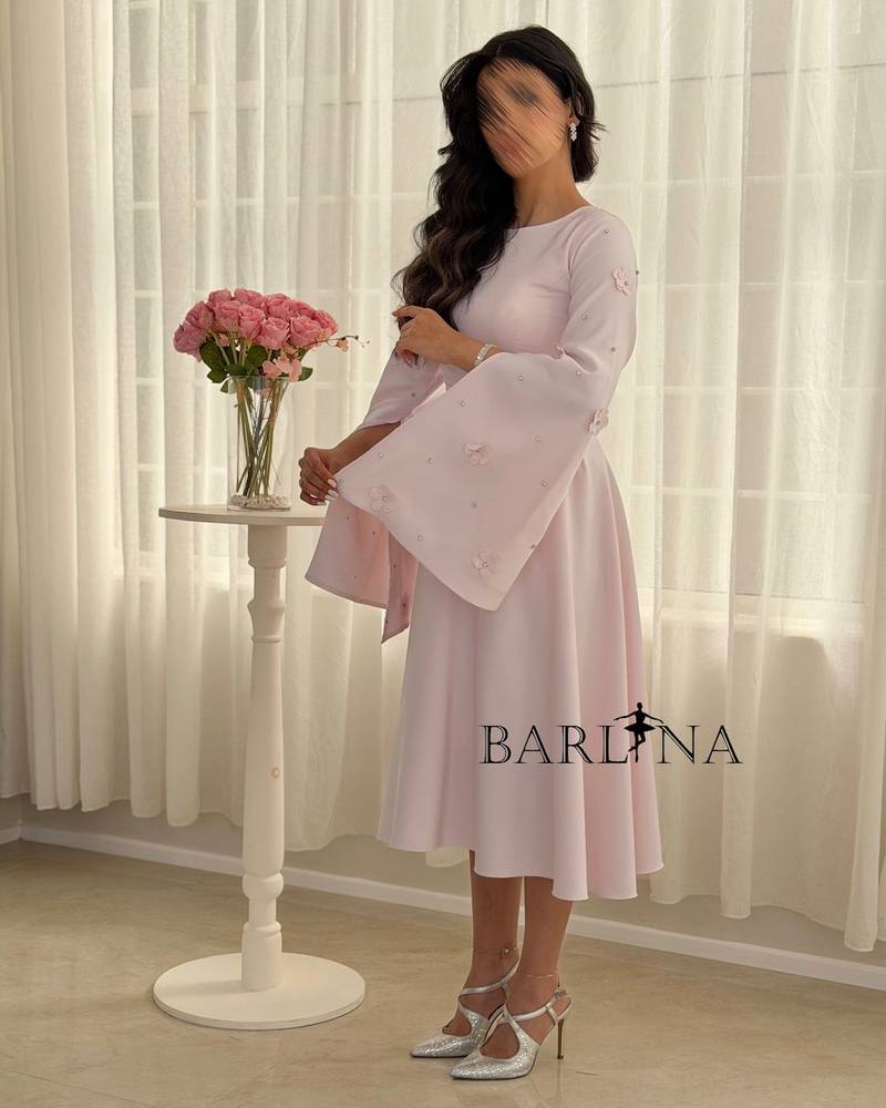Light pink midi dress with floral sleeves