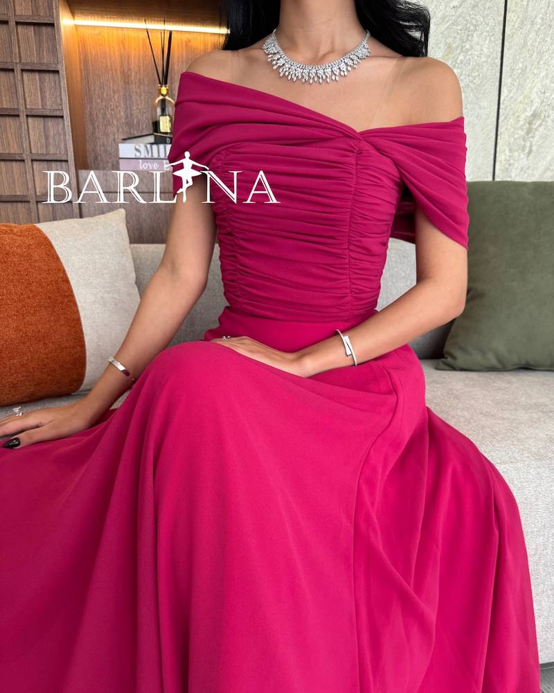 Elegant long ofF-the-shoulder dress in fuchsia