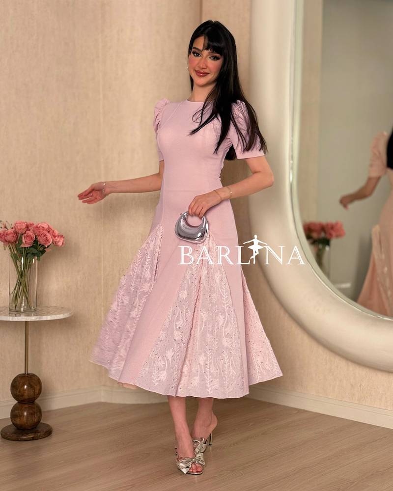 Pink midi dress with a soft  feminine cut