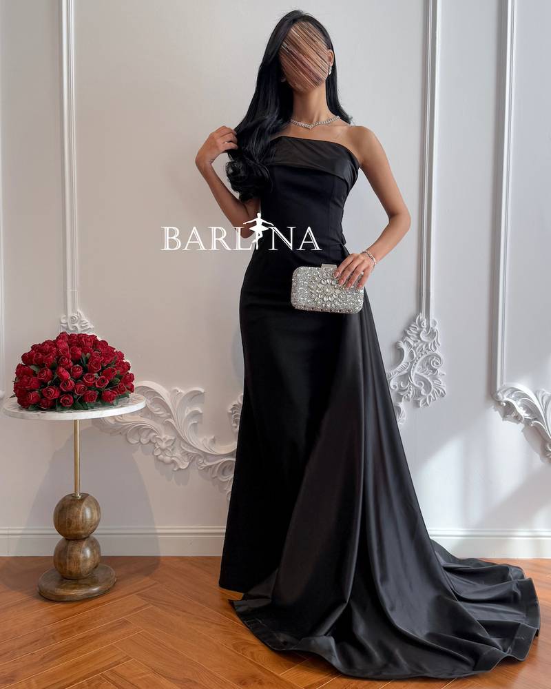 Black bodycon dress with long tail