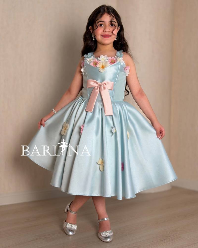 Sky blue girl's dress decorated with colorful roses