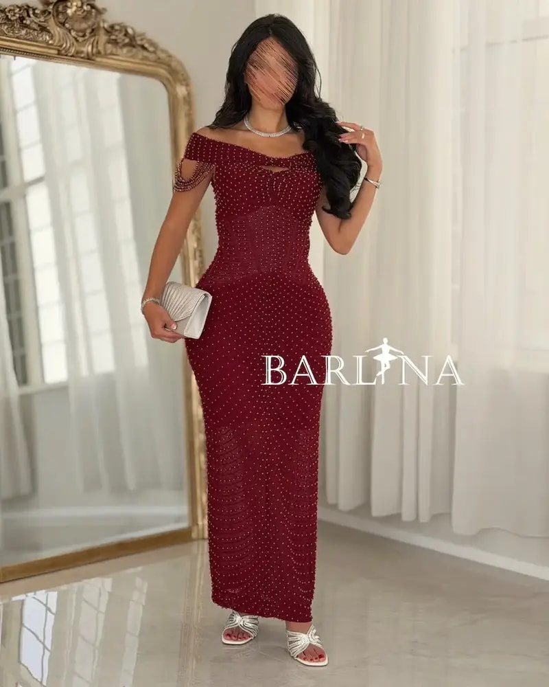 Burgundy evening dress fully embellished with pearls