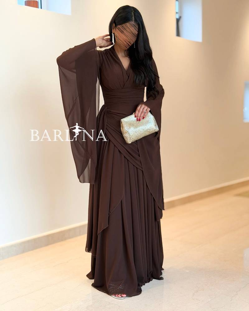 Soft brown chiffon dress with a draped design
