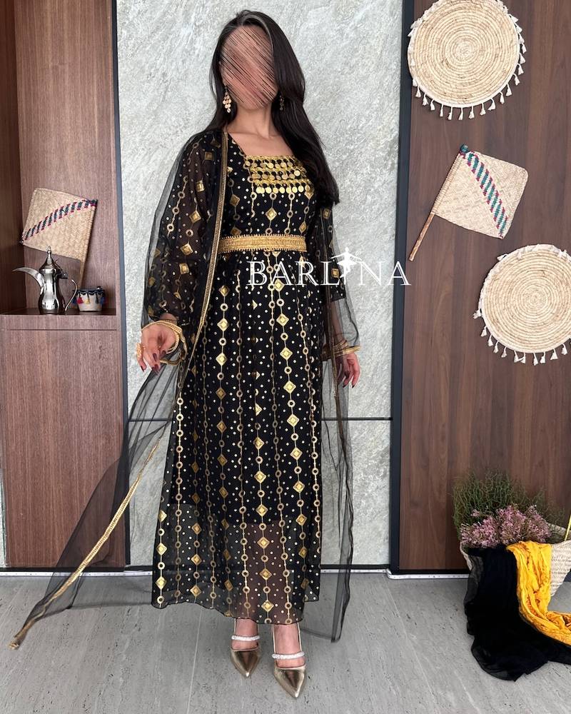 Traditional black jalabiya with sheer abaya