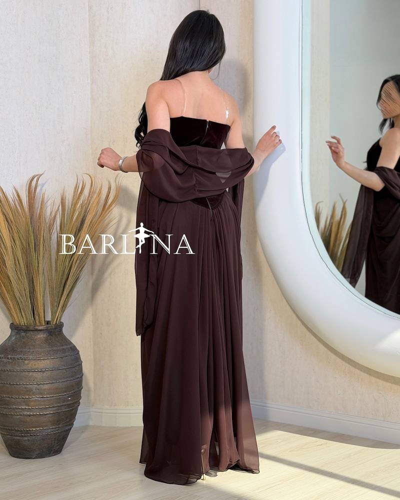 Elegant brown dress adorned with pearl chains