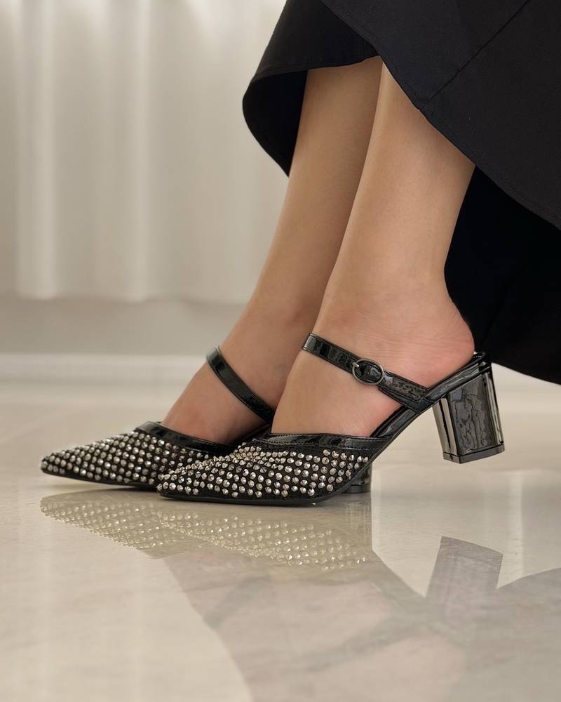 Elegant women's heels fully studded with sparkling gems