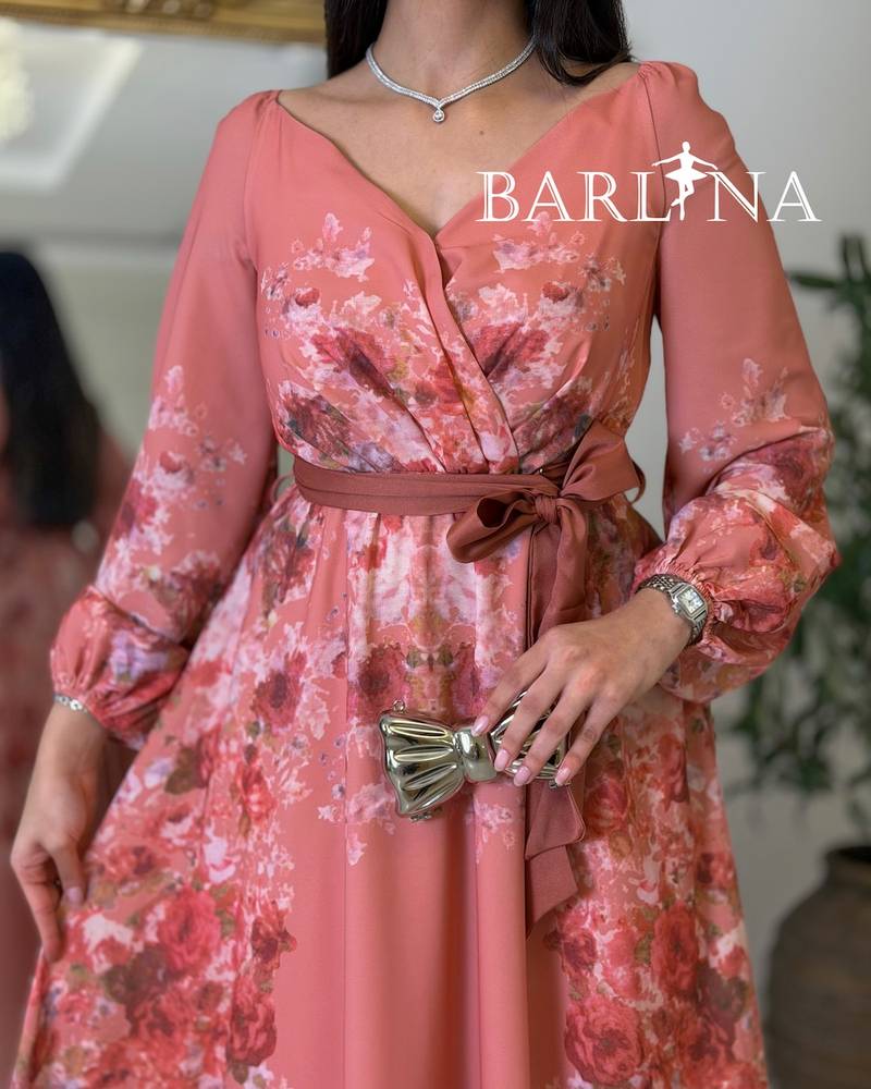 Pink floral dress with a V-neck and belt