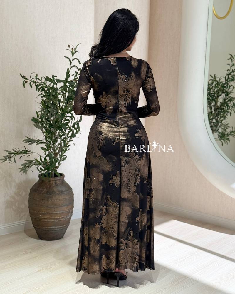 A soft black dress with gold rose patterns