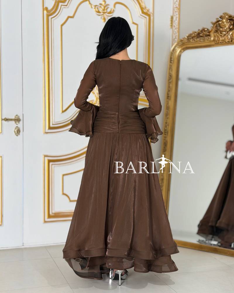 Brown dress with sheer fabric and light layers