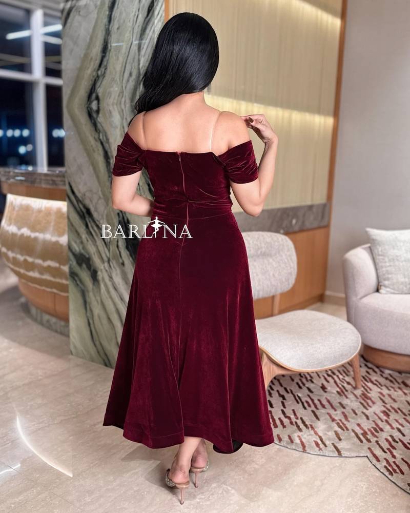 Burgundy velvet dress with soft pleats