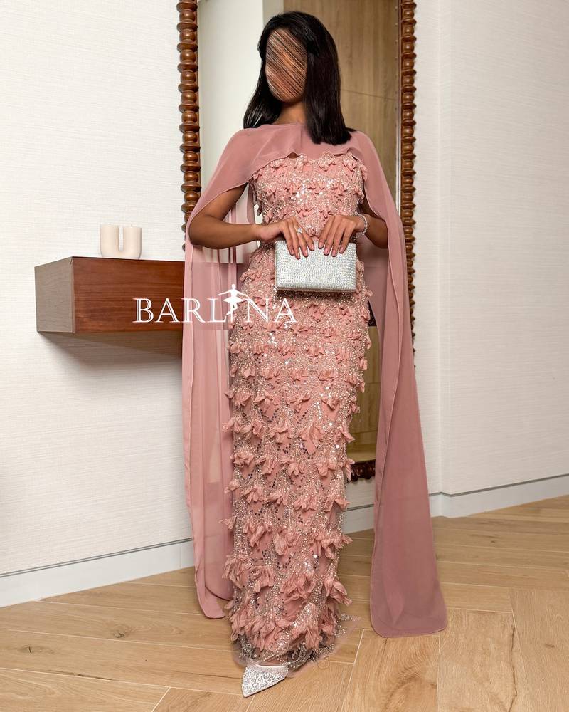 nude-colored dress with sheer cape