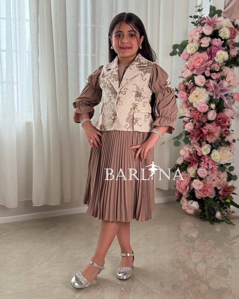 Brown two-piece girl's dress with a patterned jacket