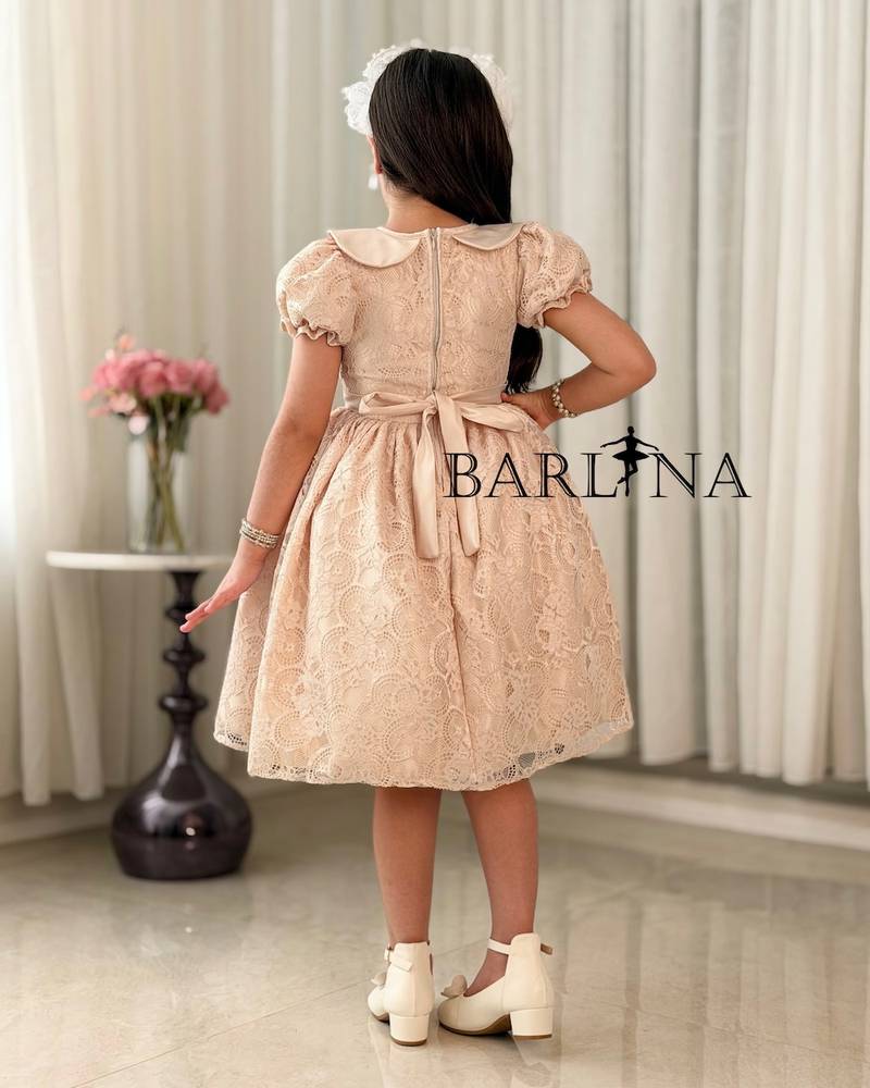 Beige girl's dress with a bow belt