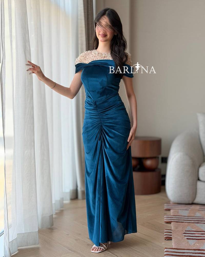 Blue velvet dress with pearl details