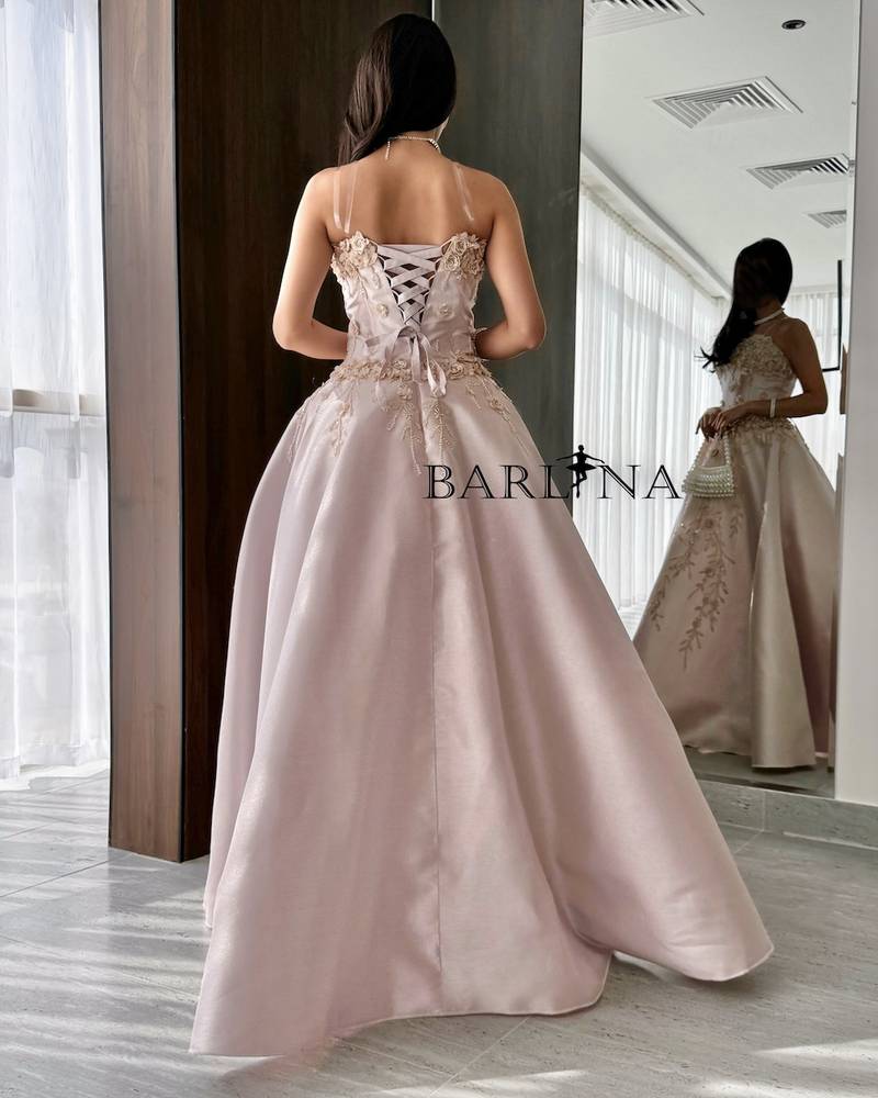 Light pink dress with prominent floral design