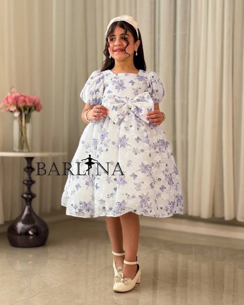 Girls' fluffy dress with a purple floral print