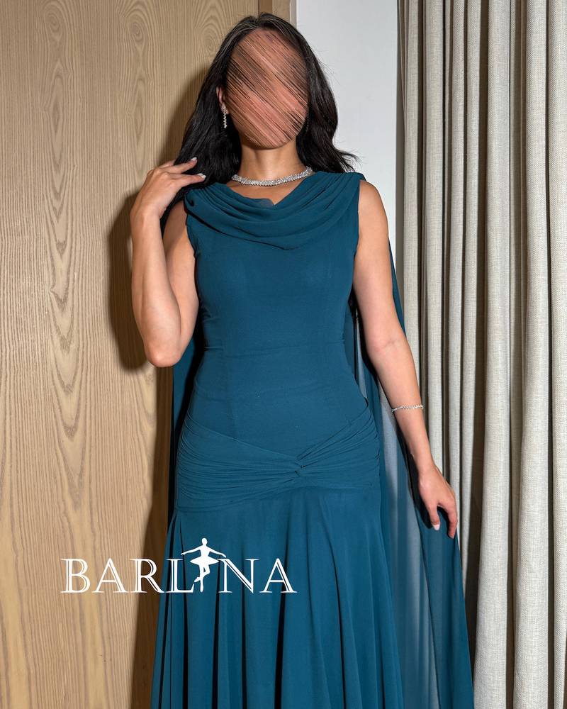 Petrol dress with a draped back cape