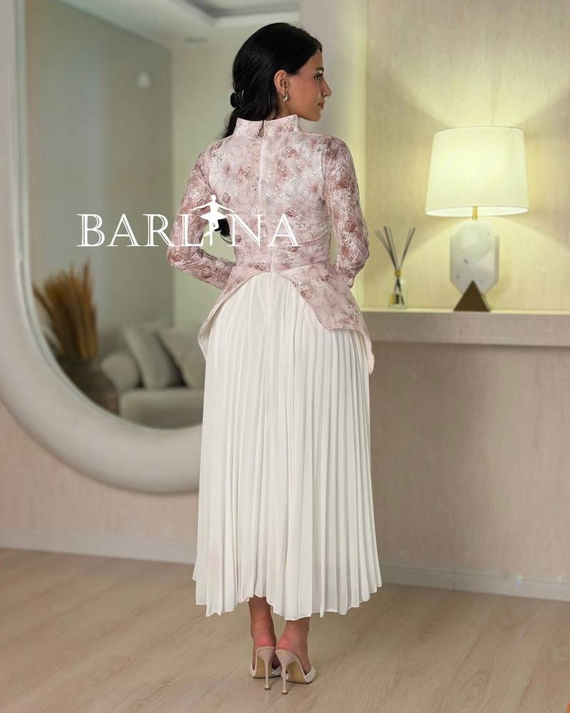 Pink lace dress with a soft bow tie