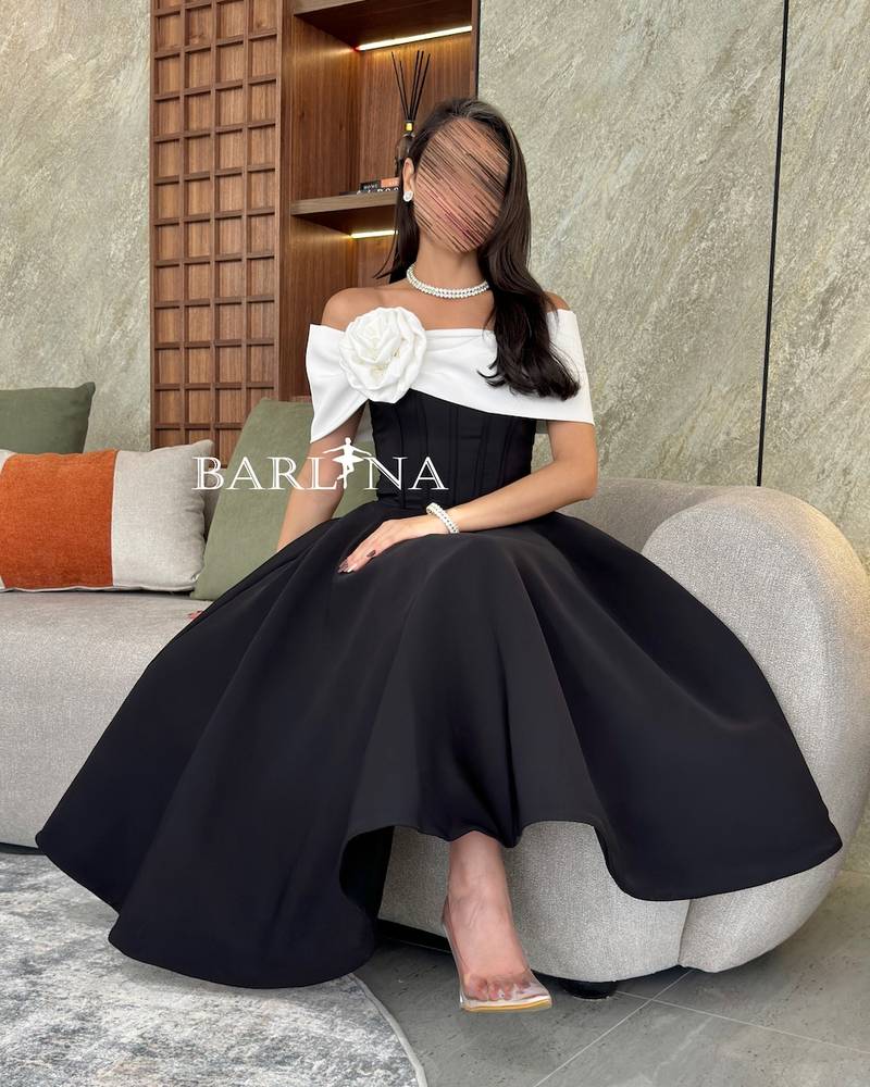 Black corset dress with white flower