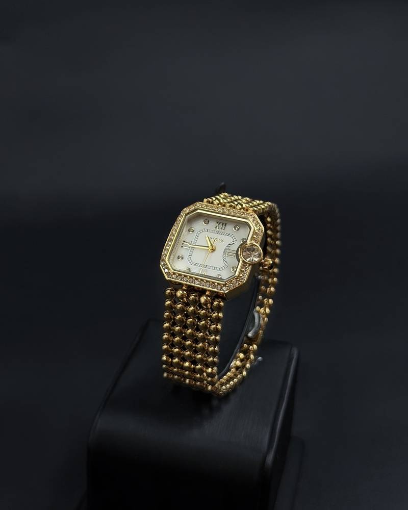 Women's watch with a bezel studded with sparkling beads