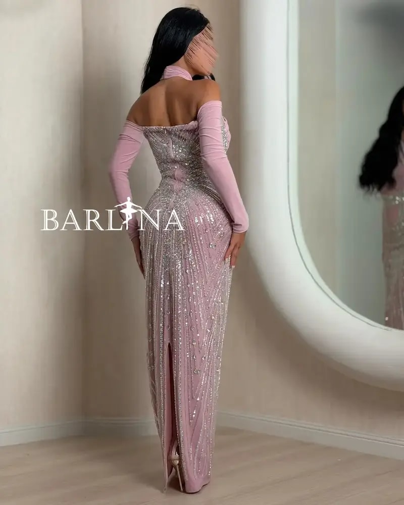 Pink evening dress with a cross-neck halter neck