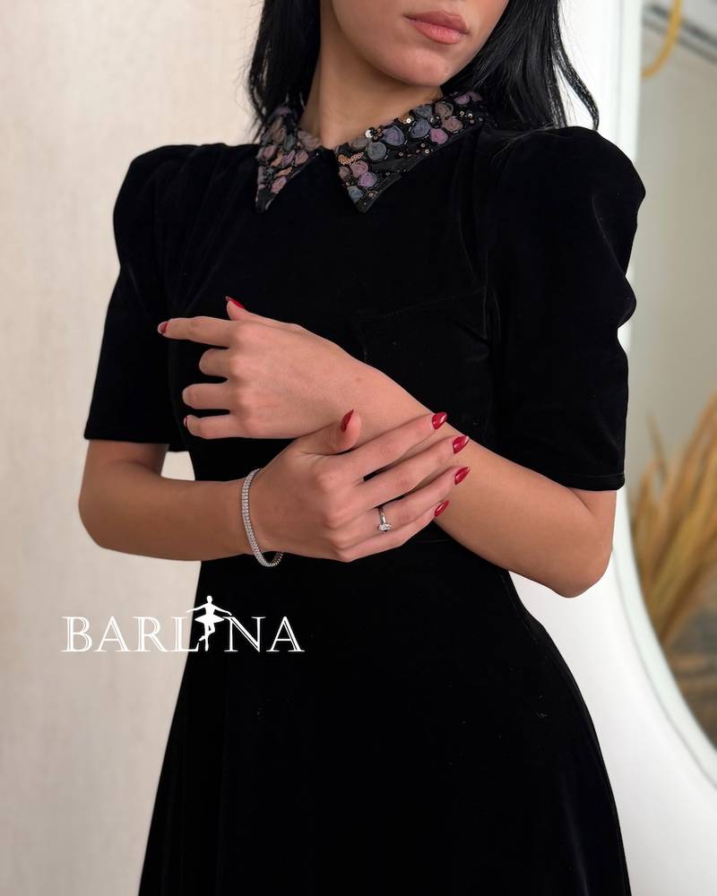 Black velvet dress with mid-length sleeves