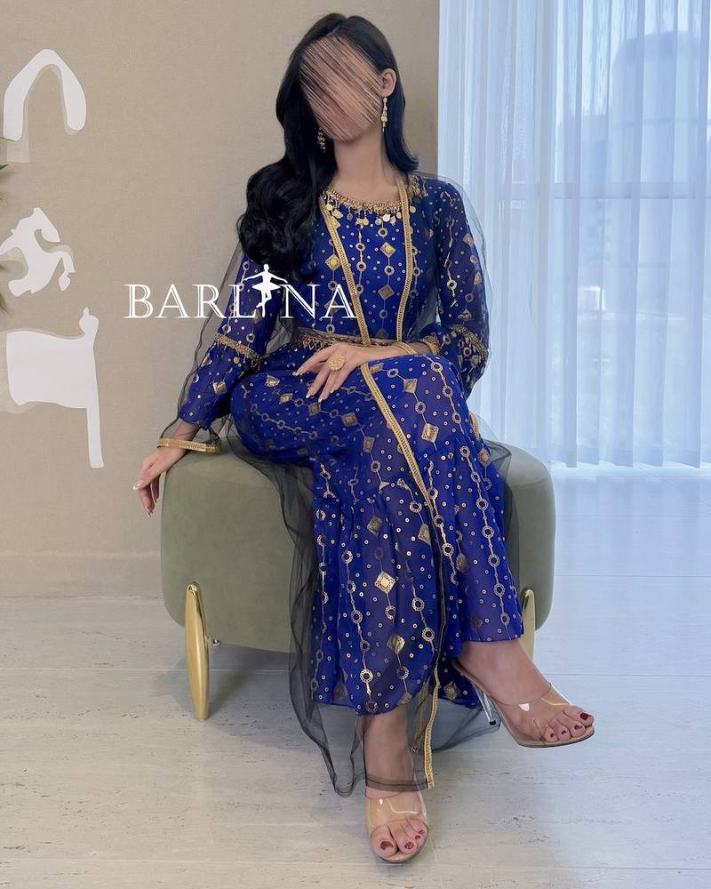 Traditional blue jalabiya with sheer abaya