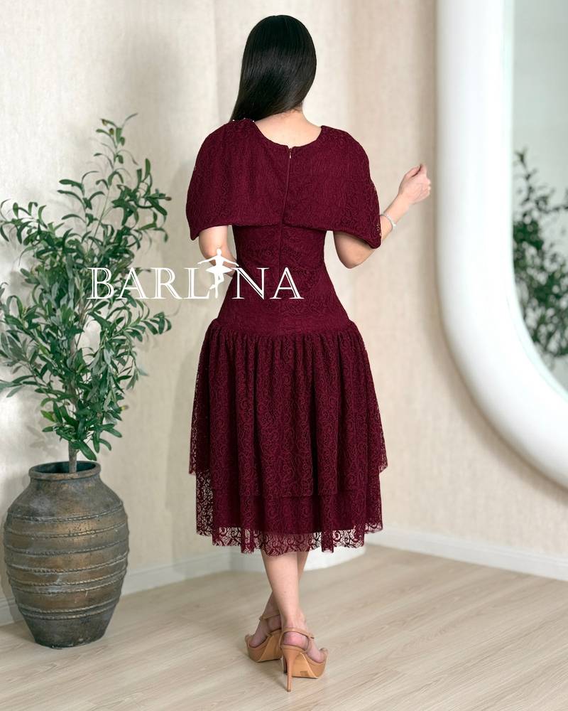 Burgundy lace dress with a feminine cut
