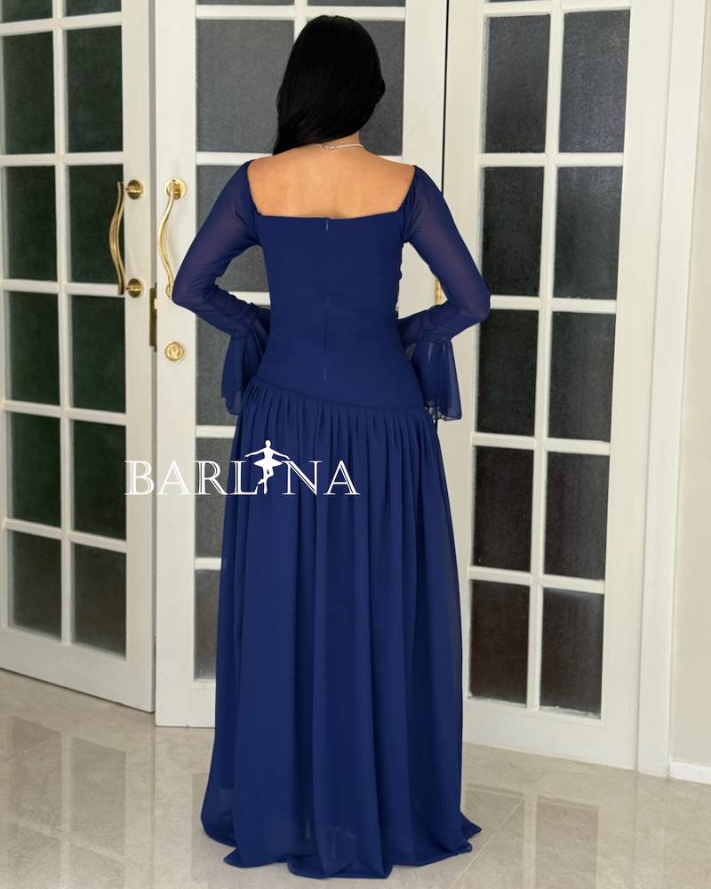 Soft blue dress with pleats and sheer sleeves