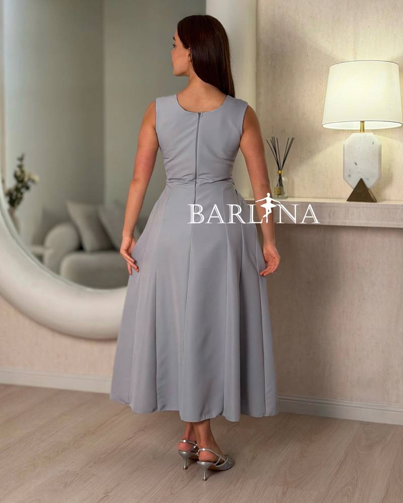 Soft gray dress with a fitted cut