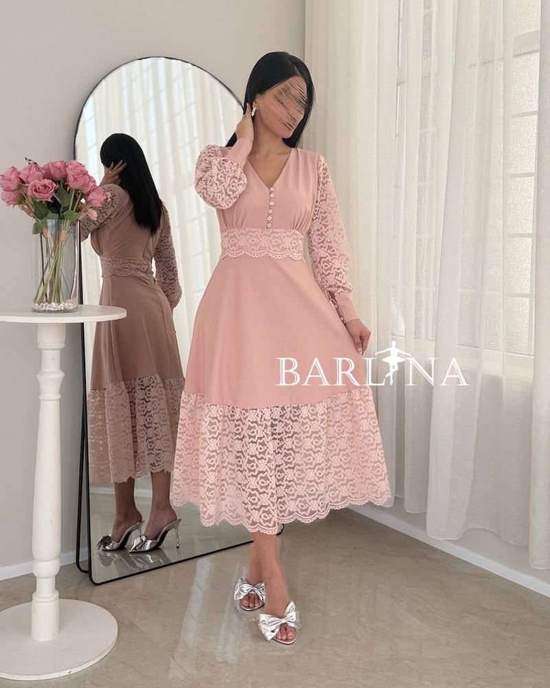 Pink midi dress with soft lace sleeves