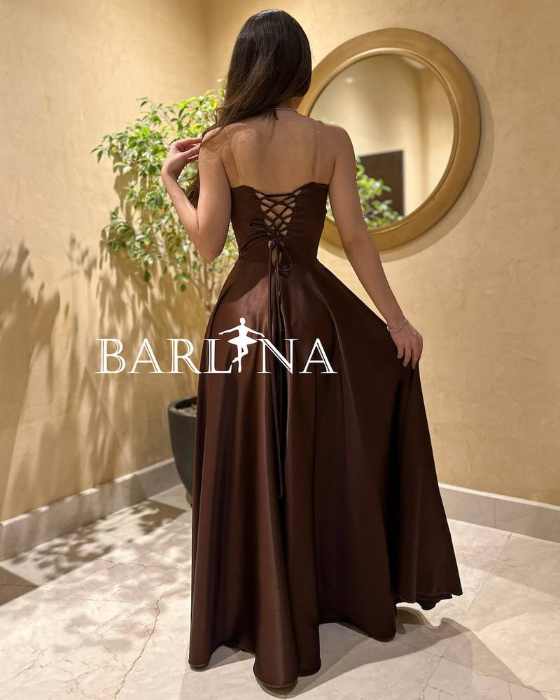 Shiny brown dress with elegant front bow