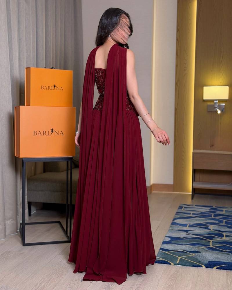 Burgundy georgette evening dress with a wide cut