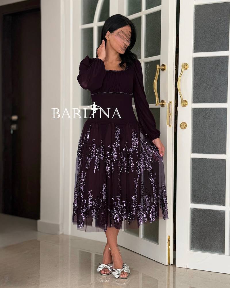 Dark purple midi dress with a touch of soft sequins