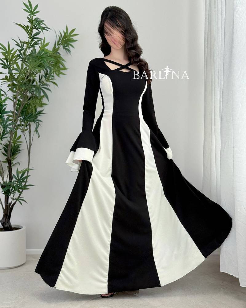 A soft, black and white dress with a flared cut