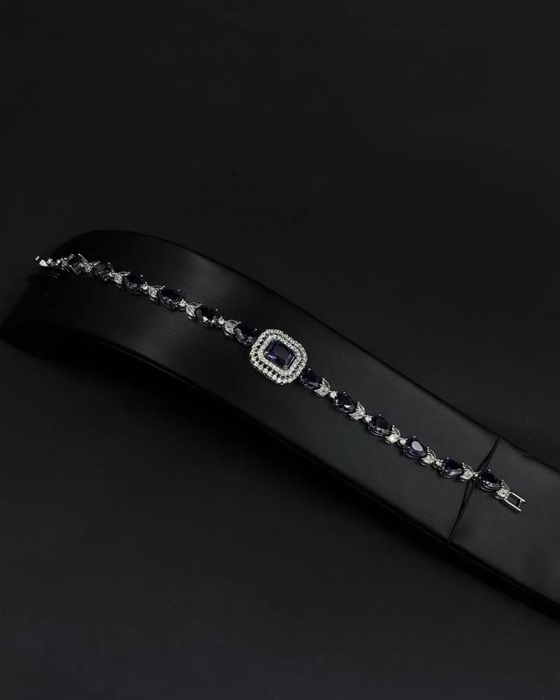 Elegant navy blue accessory set with dangling details
