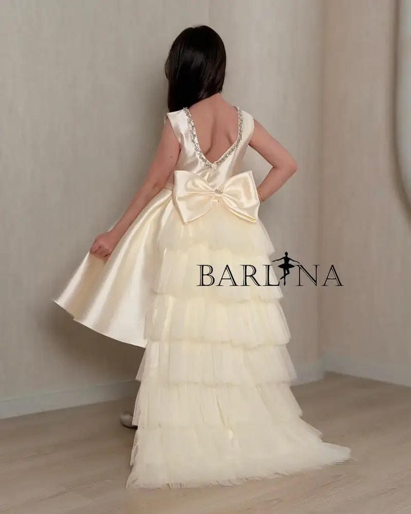 Girls' off-white evening dress with embroidered waist