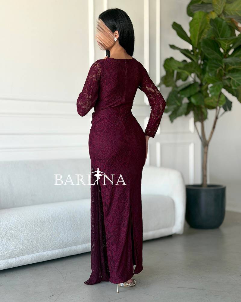 Burgundy lace dress with a fitted design