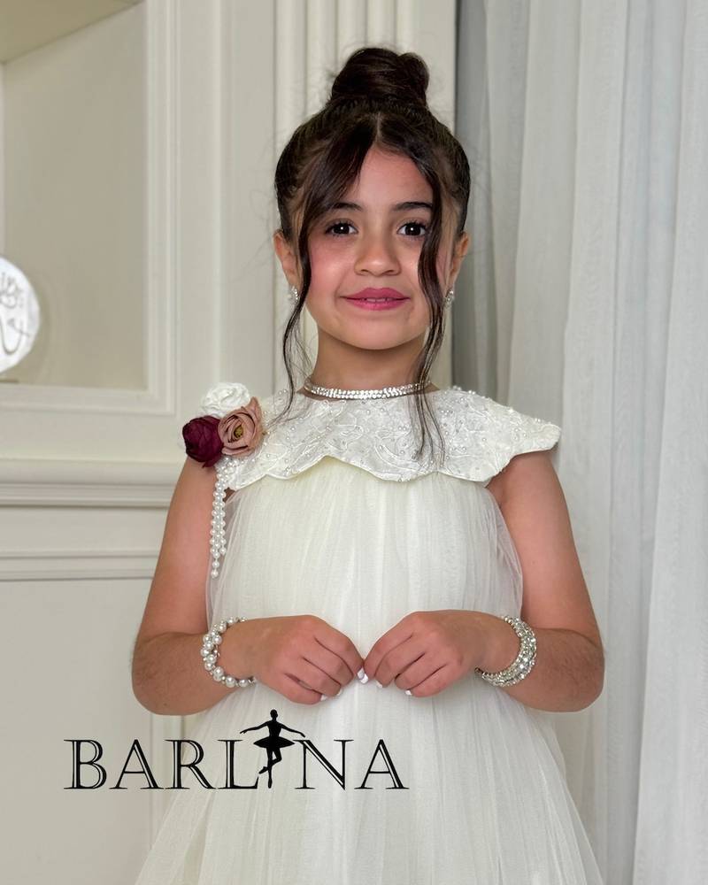 Ivory tulle girls' dress with a soft design
