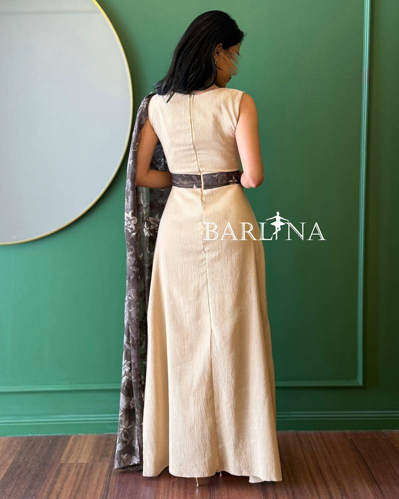 Elegant beige dress with floral sleeves