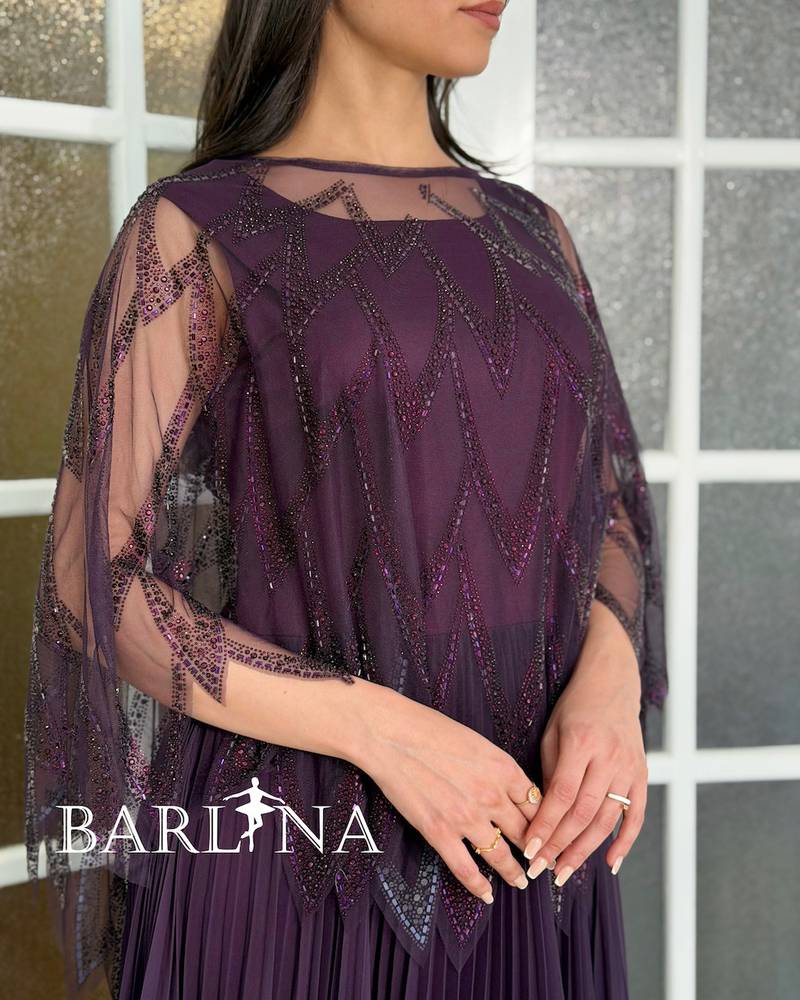 Long dress in a purple gradient with a pleated design