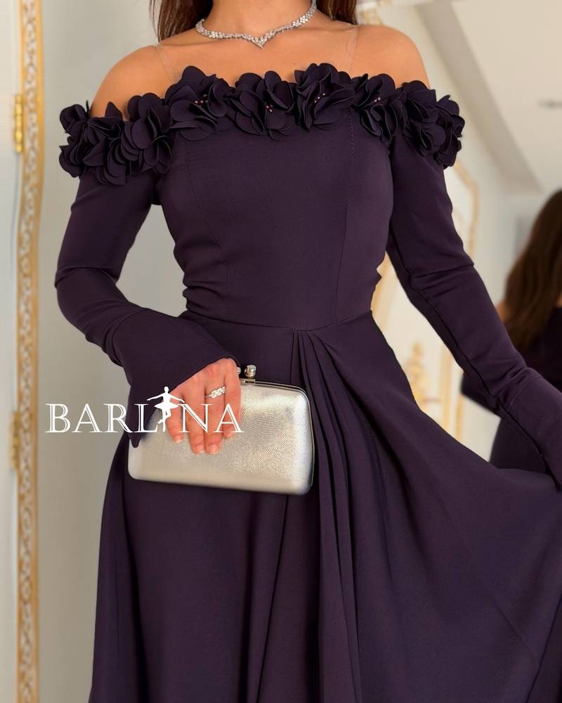 Lilac occasion dress with rose embellishments on the shoulder