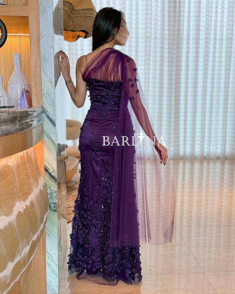 Elegant purple dress embroidered with sequins
