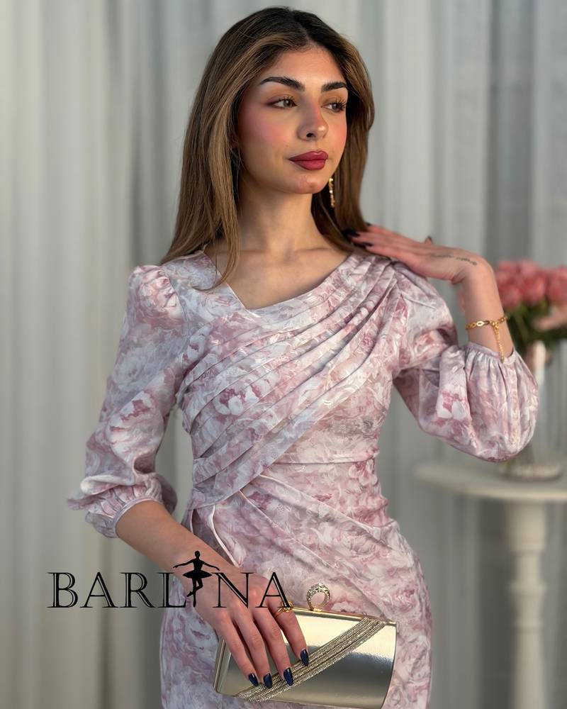 A pink dress with delicate floral patterns