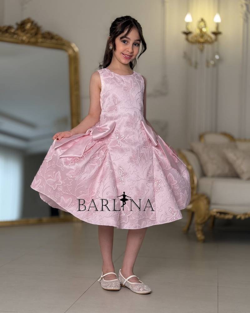 Pink girl's dress with side bow detail