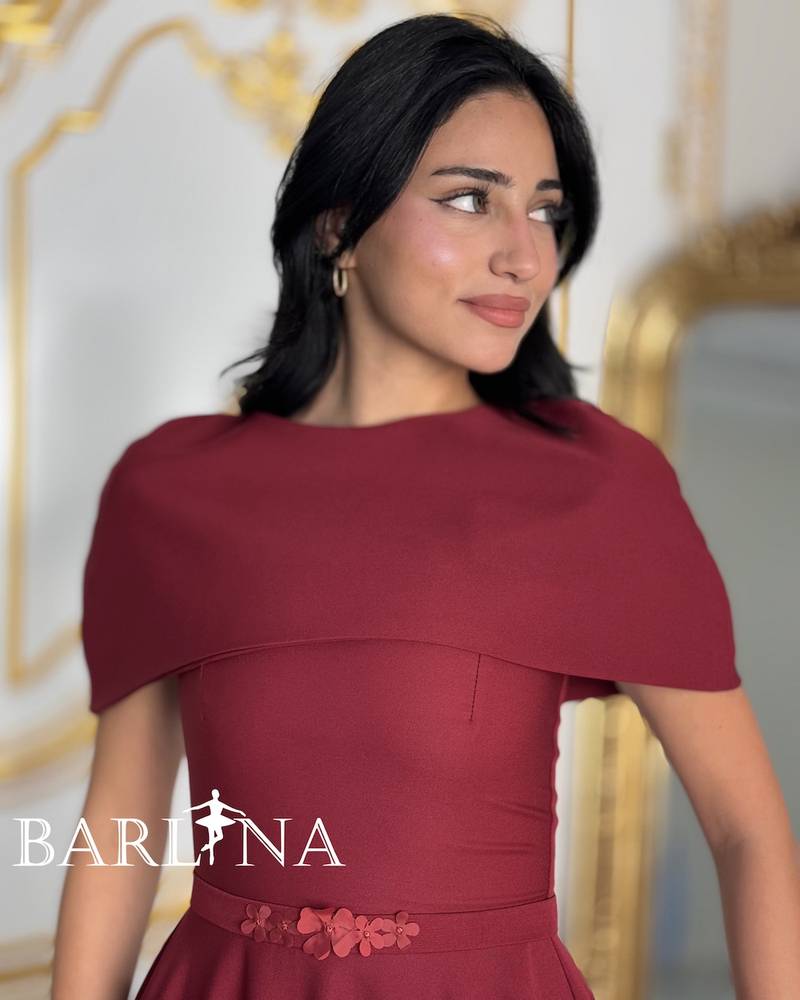 Loose burgundy dress with a covered neckline