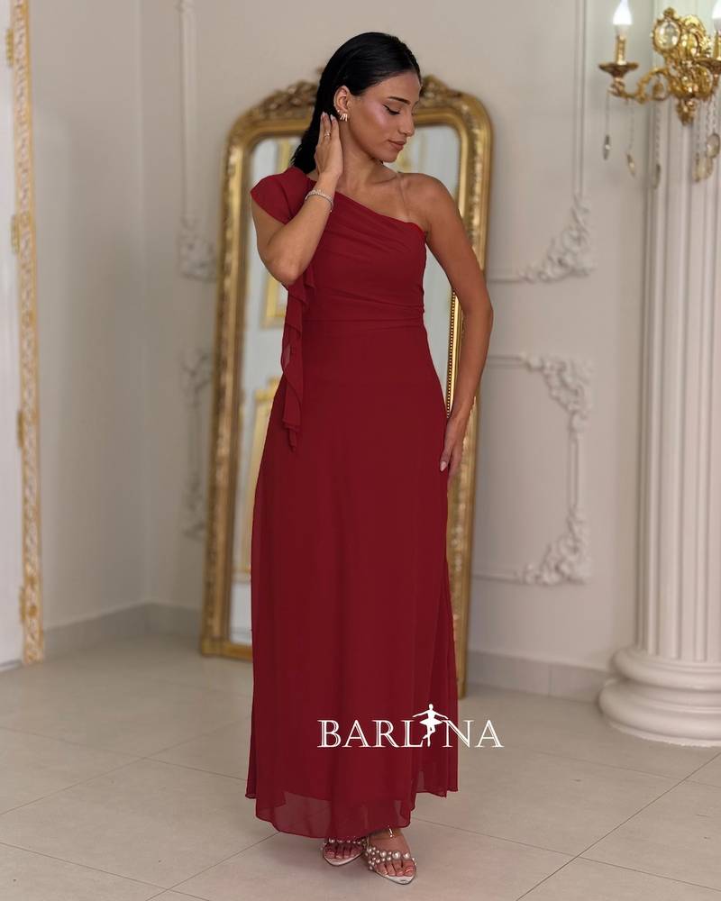One-shoulder burgundy dress with a soft cut