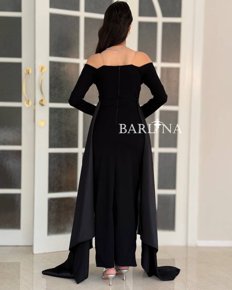 Black off-shoulder dress with a soft side train