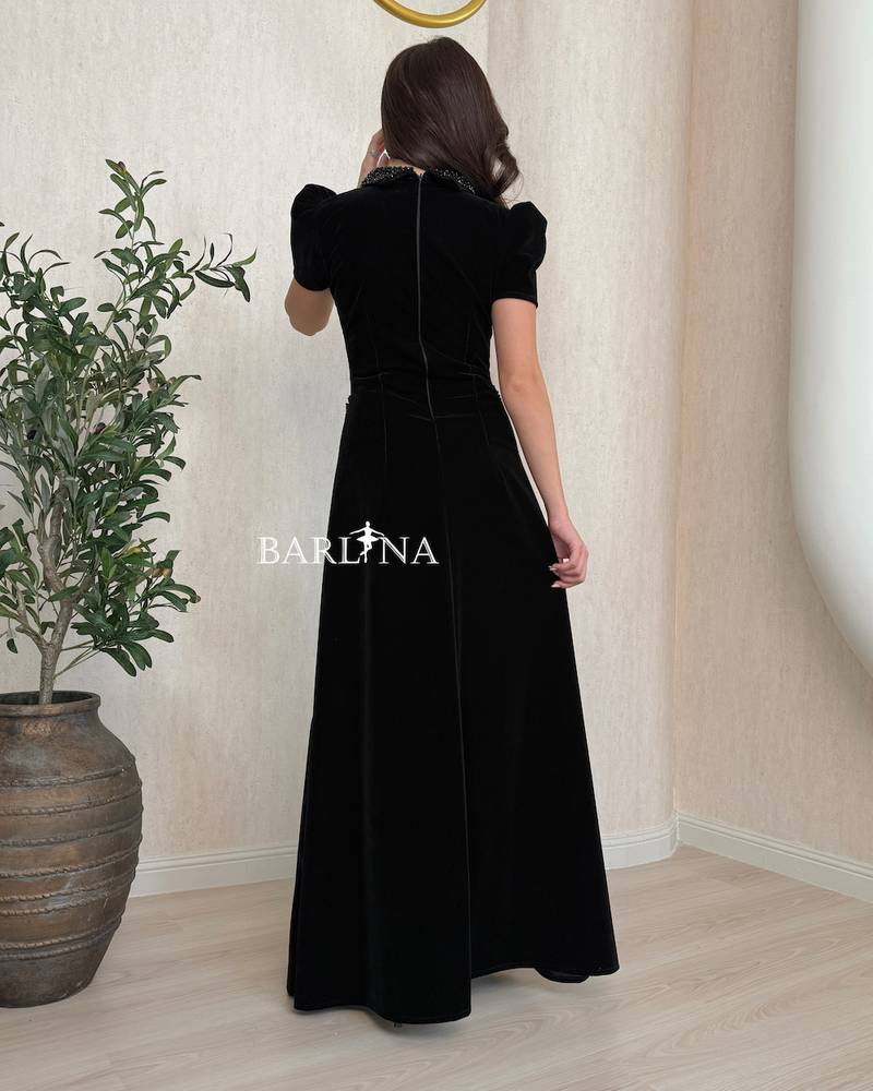 Black velvet dress with delicate chains