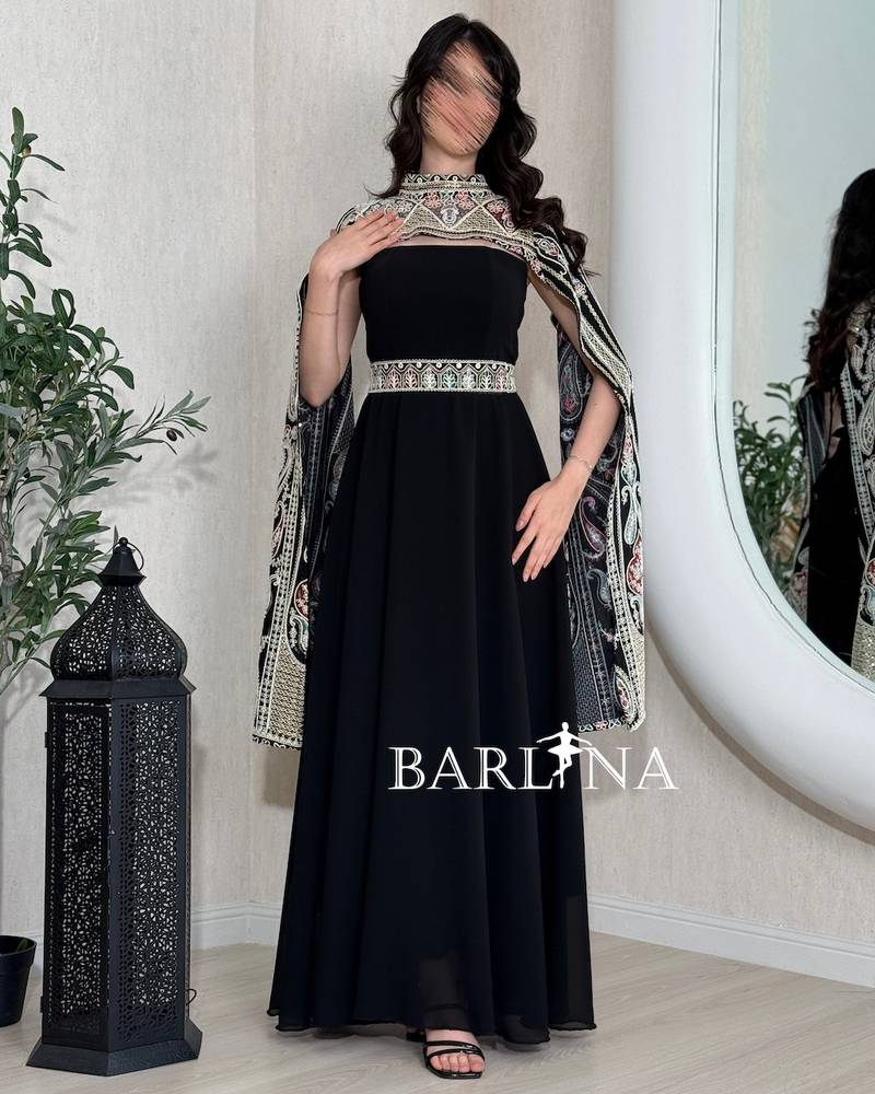 Black jalabiya with a separate embroidered cape